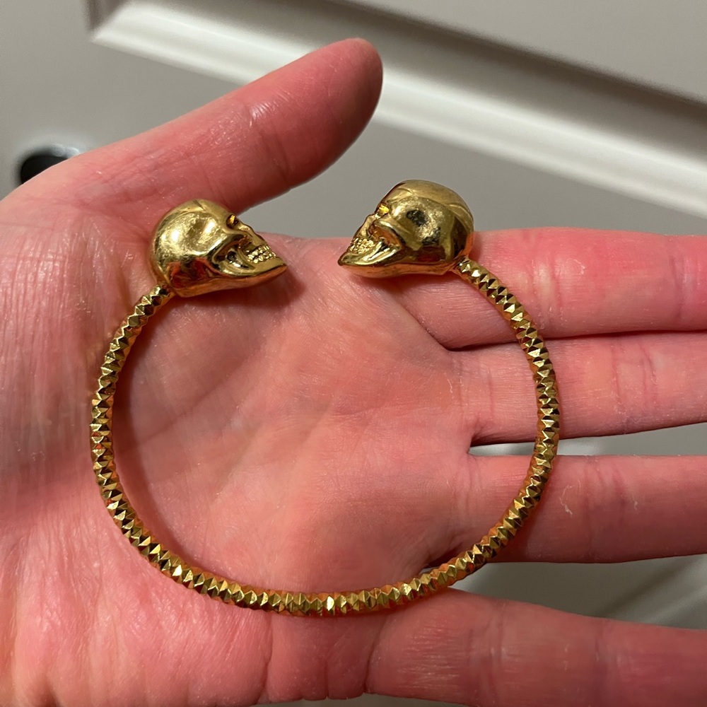 Alexander McQueen Gold tone Twin Skull Cuff Bracelet